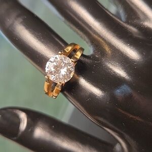 Source Unknown Gold Ring with Clear Round Solitaire Stone.  It looks real!